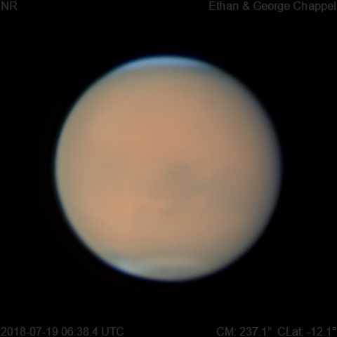 The South Polar Cap appears muted by the dust storm.